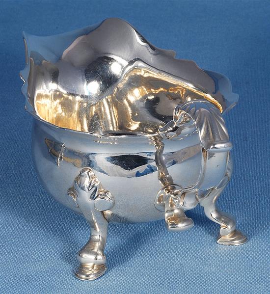 A pair of George II silver sauce boats, attributed to Joseph Sanders, length 195mm, weight 24.4 oz/760grms.